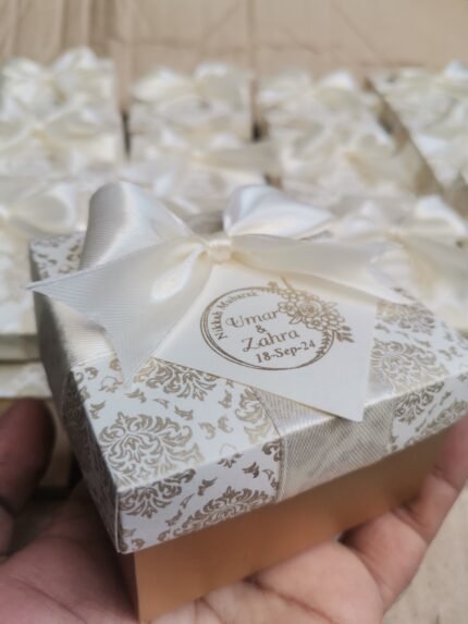 White And Golden Box With Bow