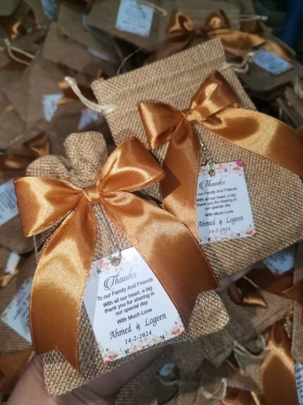 Jute pouch With golden RIbbon & hanging Tag
