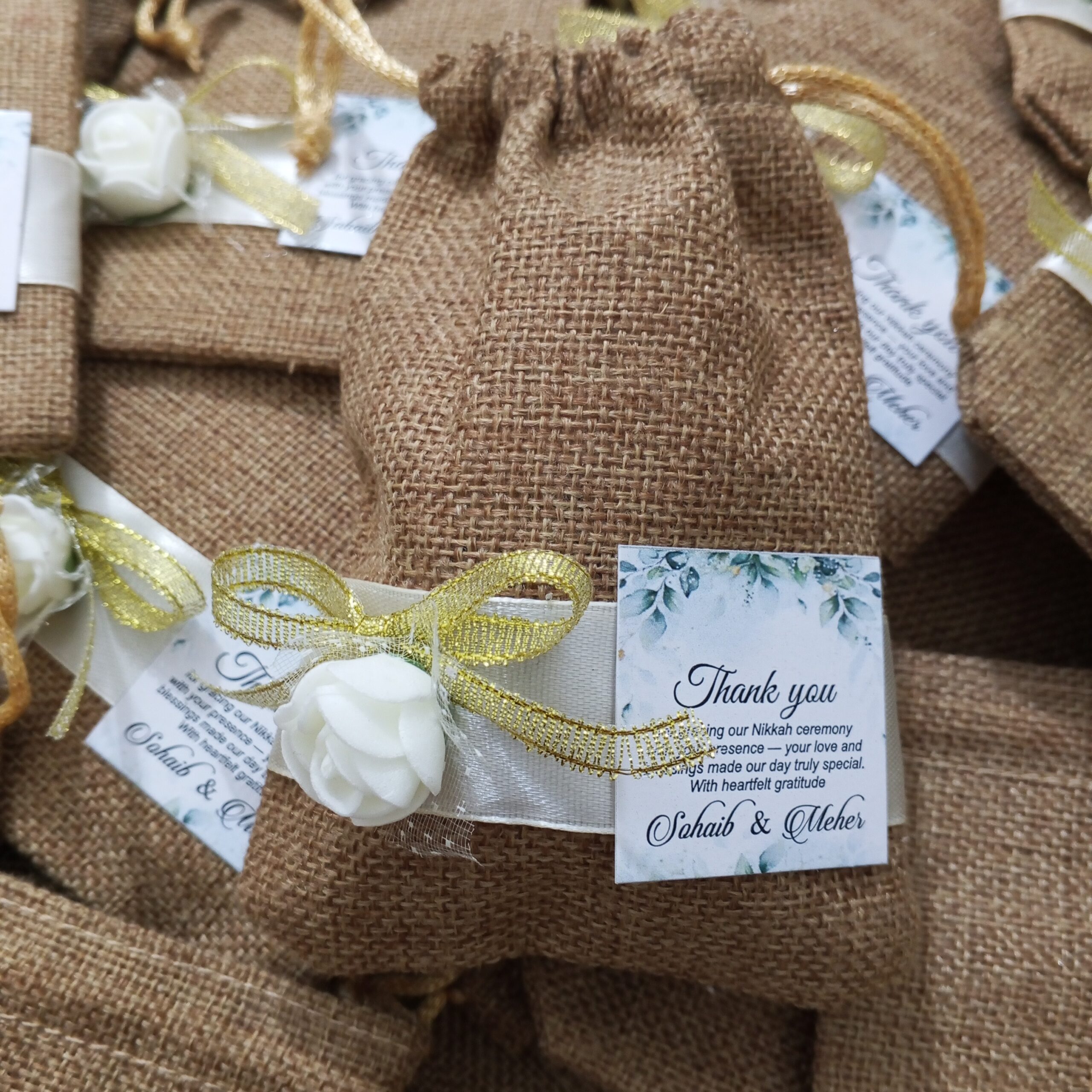 Floral Jute Pouch With Tag Floral Jute Pouch With Tag