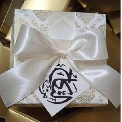 White And Golden Box With Bow